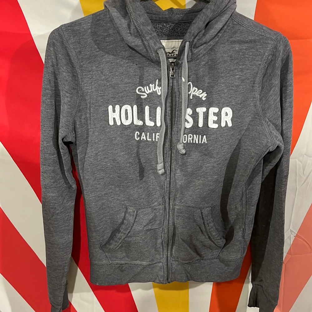 Hollister zip up hoodie gray with logo on front